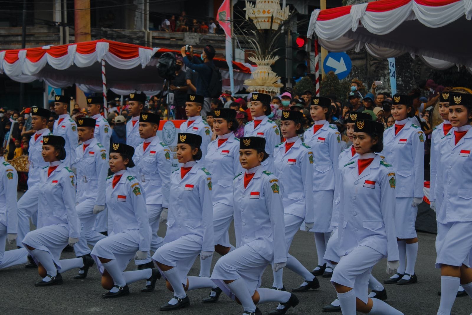 Youth in ceremonial uniform marching in an Independence Day parade in Bali